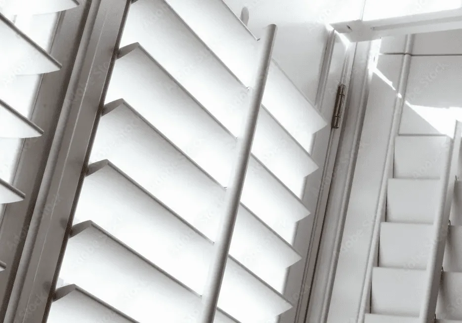Close-up of white Norman plantation shutter louvers installed by Shutter King USA in Indianapolis